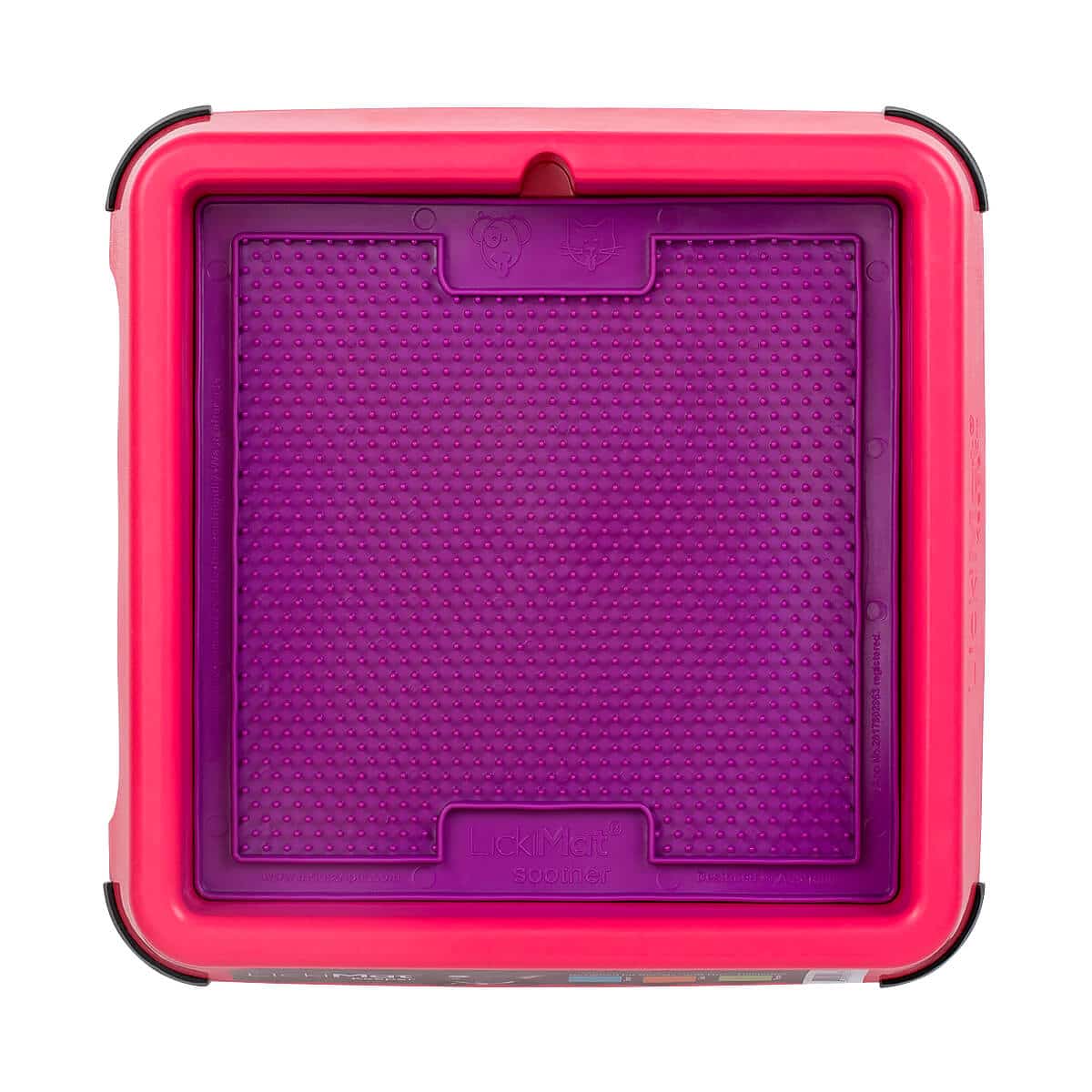 Pinkki LickiMat Keeper, jonka sisällä on violetti Soother aktivointimatto.